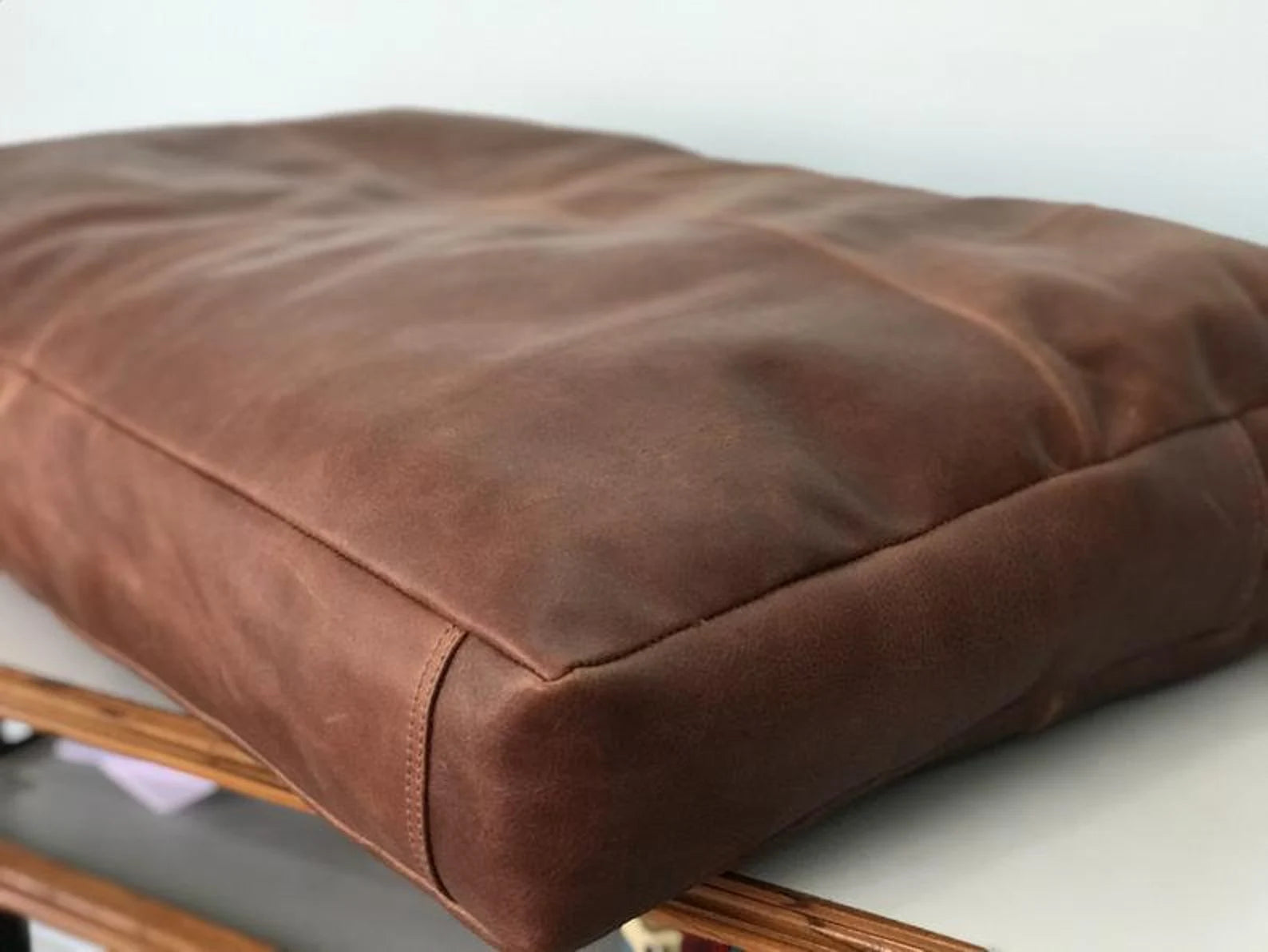 Brown leather RV dinette cushion cover detail